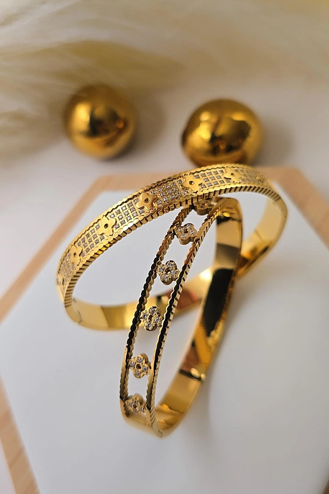 Gold bracelet with intricate designs