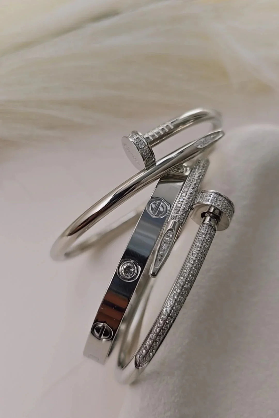 Stack of elegant silver bracelets with crystal accents from Bliss Bymi jewellery collection